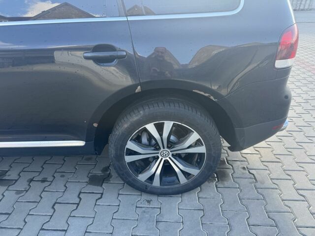 Чорний Фольксваген Туарег, об'ємом двигуна 3 л та пробігом 401 тис. км за 9200 $, фото 4 на Automoto.ua