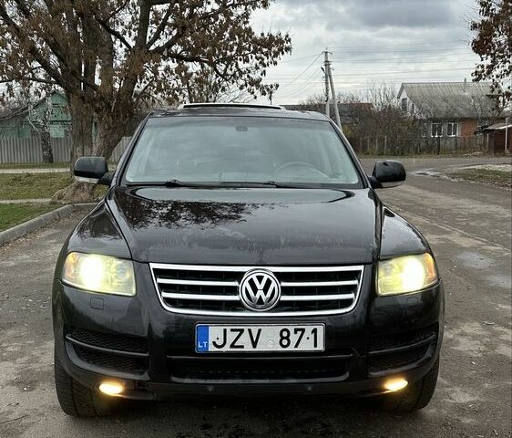 Чорний Фольксваген Туарег, об'ємом двигуна 3 л та пробігом 250 тис. км за 3350 $, фото 4 на Automoto.ua