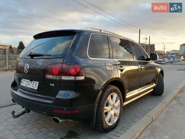 Чорний Фольксваген Туарег, об'ємом двигуна 3.6 л та пробігом 300 тис. км за 12500 $, фото 4 на Automoto.ua