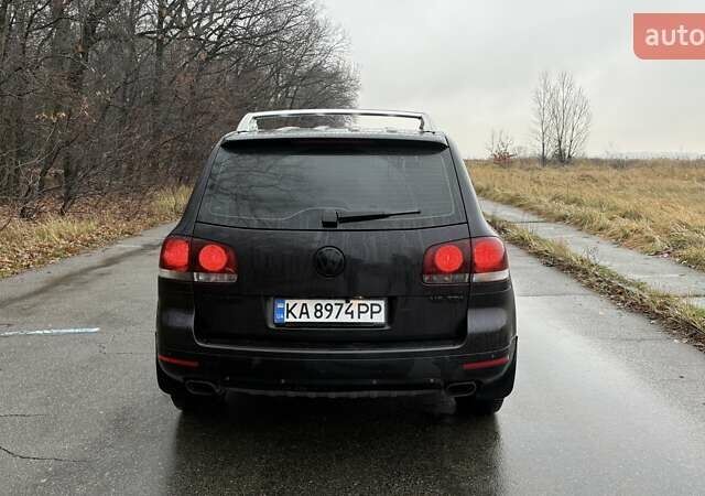 Черный Фольксваген Туарег, объемом двигателя 3 л и пробегом 239 тыс. км за 10300 $, фото 5 на Automoto.ua