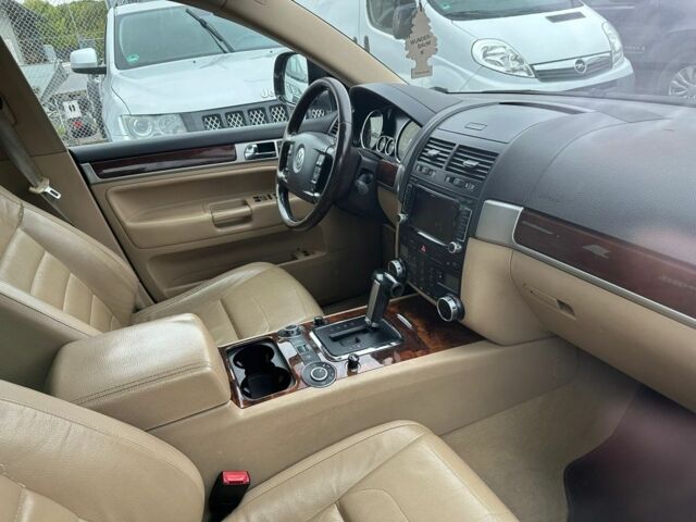 Черный Фольксваген Туарег, объемом двигателя 3 л и пробегом 312 тыс. км за 7300 $, фото 3 на Automoto.ua