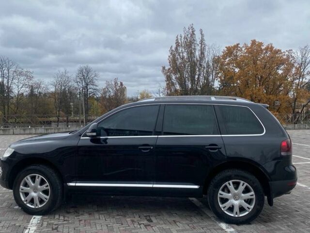 Чорний Фольксваген Туарег, об'ємом двигуна 3 л та пробігом 207 тис. км за 12000 $, фото 3 на Automoto.ua