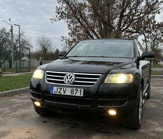 Чорний Фольксваген Туарег, об'ємом двигуна 3 л та пробігом 250 тис. км за 3350 $, фото 1 на Automoto.ua