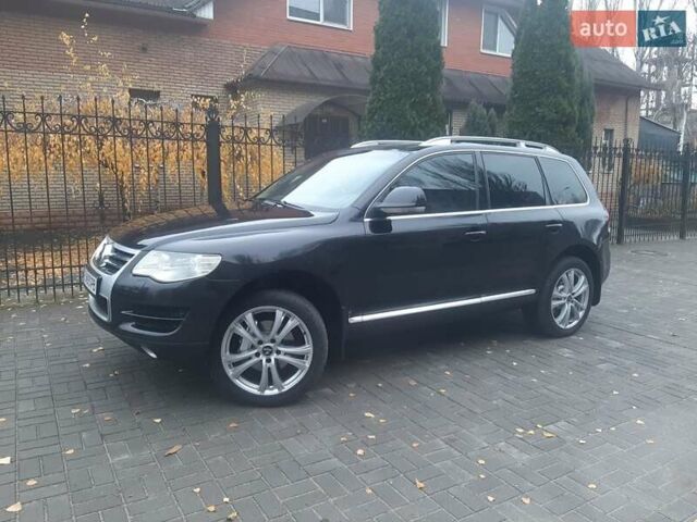 Черный Фольксваген Туарег, объемом двигателя 3 л и пробегом 445 тыс. км за 11500 $, фото 1 на Automoto.ua