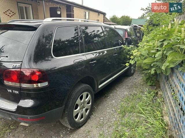 Черный Фольксваген Туарег, объемом двигателя 2.97 л и пробегом 275 тыс. км за 12300 $, фото 1 на Automoto.ua