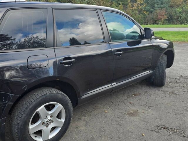 Черный Фольксваген Туарег, объемом двигателя 2.5 л и пробегом 352 тыс. км за 7500 $, фото 1 на Automoto.ua