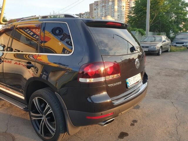Чорний Фольксваген Туарег, об'ємом двигуна 3 л та пробігом 205 тис. км за 12000 $, фото 4 на Automoto.ua