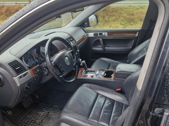 Чорний Фольксваген Туарег, об'ємом двигуна 3 л та пробігом 250 тис. км за 6648 $, фото 2 на Automoto.ua