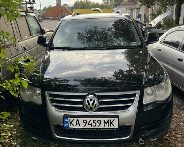 Черный Фольксваген Туарег, объемом двигателя 2.52 л и пробегом 237 тыс. км за 6500 $, фото 1 на Automoto.ua