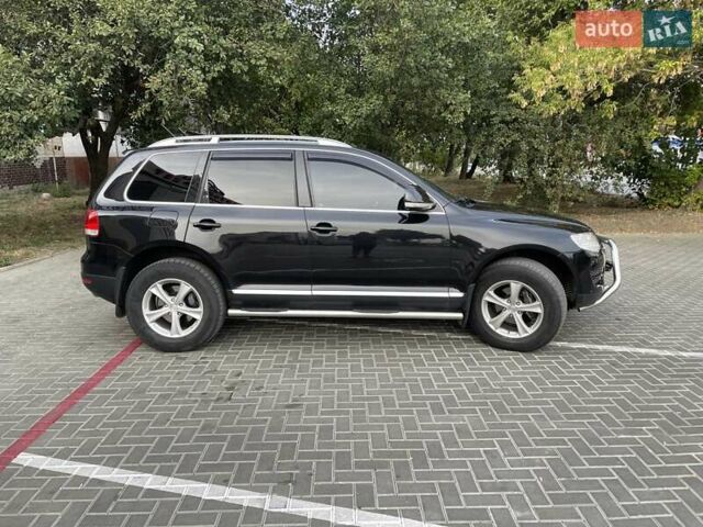 Чорний Фольксваген Туарег, об'ємом двигуна 3 л та пробігом 220 тис. км за 10500 $, фото 3 на Automoto.ua