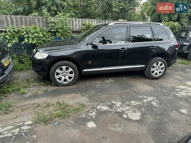 Черный Фольксваген Туарег, объемом двигателя 2.97 л и пробегом 275 тыс. км за 12300 $, фото 3 на Automoto.ua