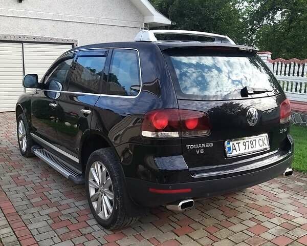 Черный Фольксваген Туарег, объемом двигателя 0 л и пробегом 218 тыс. км за 11900 $, фото 7 на Automoto.ua