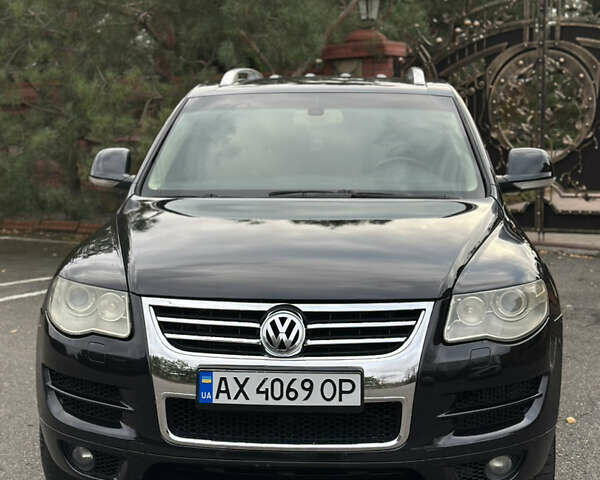 Черный Фольксваген Туарег, объемом двигателя 4.9 л и пробегом 340 тыс. км за 7900 $, фото 1 на Automoto.ua