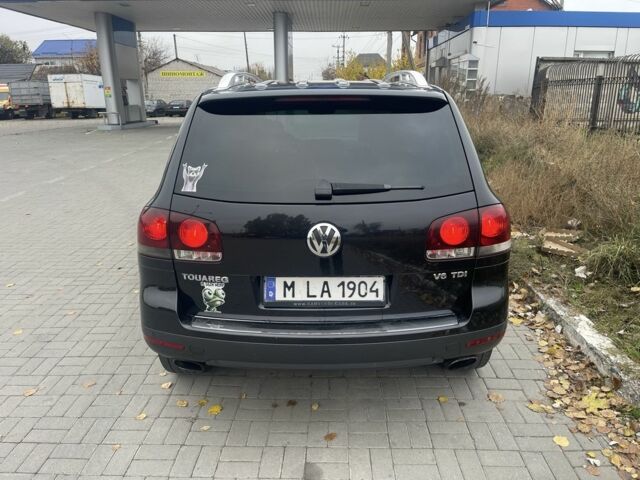 Черный Фольксваген Туарег, объемом двигателя 3 л и пробегом 373 тыс. км за 5400 $, фото 5 на Automoto.ua