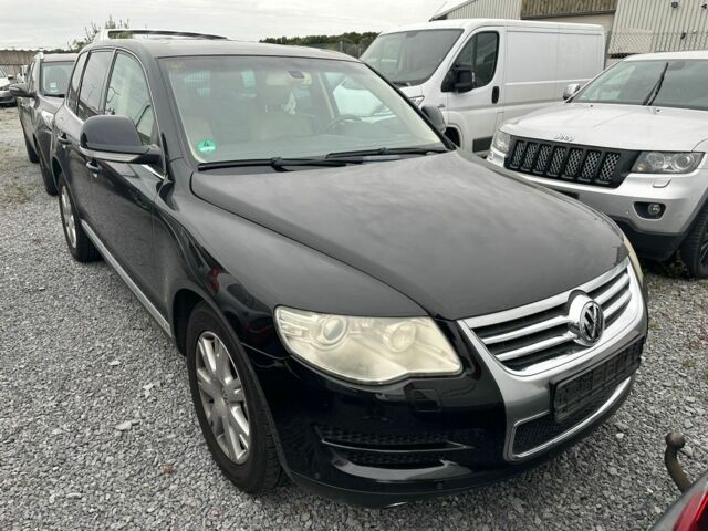 Черный Фольксваген Туарег, объемом двигателя 3 л и пробегом 312 тыс. км за 7300 $, фото 5 на Automoto.ua