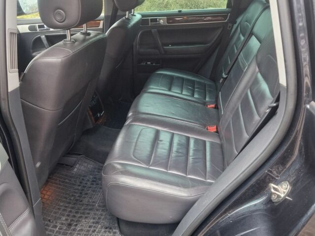 Чорний Фольксваген Туарег, об'ємом двигуна 3 л та пробігом 250 тис. км за 6648 $, фото 4 на Automoto.ua