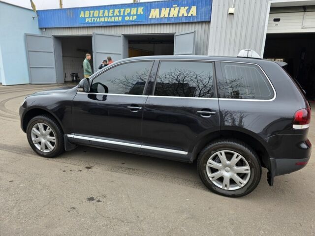 Чорний Фольксваген Туарег, об'ємом двигуна 3 л та пробігом 217 тис. км за 9000 $, фото 11 на Automoto.ua