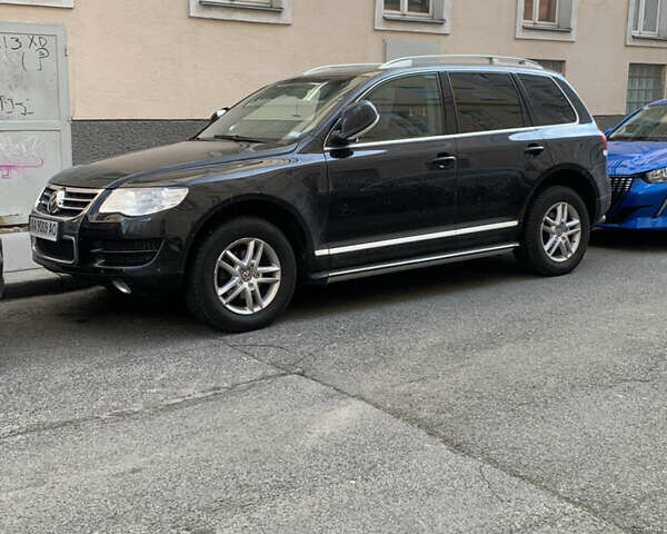 Черный Фольксваген Туарег, объемом двигателя 2.4 л и пробегом 186 тыс. км за 14755 $, фото 1 на Automoto.ua