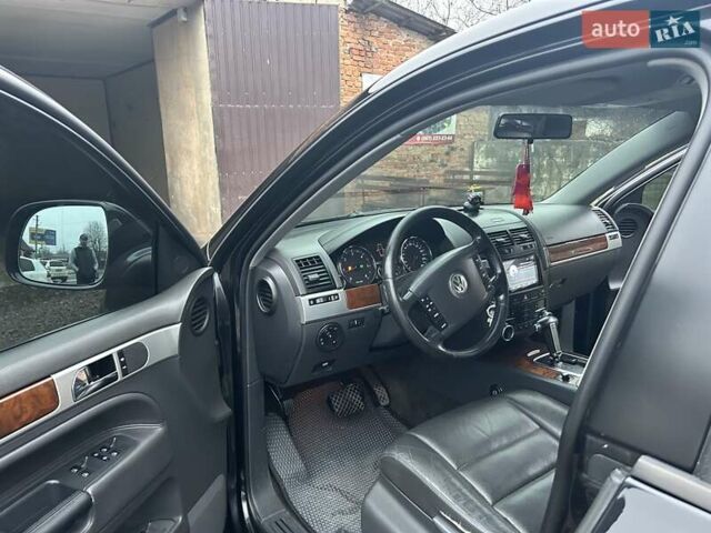 Чорний Фольксваген Туарег, об'ємом двигуна 2.46 л та пробігом 174 тис. км за 11000 $, фото 9 на Automoto.ua