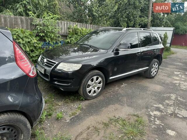 Черный Фольксваген Туарег, объемом двигателя 2.97 л и пробегом 275 тыс. км за 12300 $, фото 2 на Automoto.ua