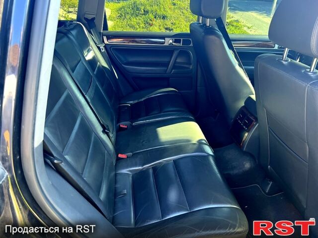 Фольксваген Туарег 2007 у Харкові на Automoto.ua Чорний Фольксваген Туарег, об'ємом двигуна 3 л та пробігом 240 тис. км за 8500 $, фото 7 на Automoto.ua