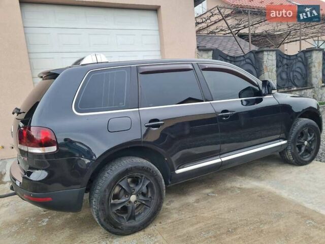Черный Фольксваген Туарег, объемом двигателя 3 л и пробегом 258 тыс. км за 10500 $, фото 3 на Automoto.ua