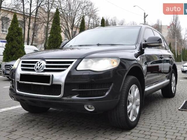 Черный Фольксваген Туарег, объемом двигателя 3 л и пробегом 335 тыс. км за 9803 $, фото 1 на Automoto.ua