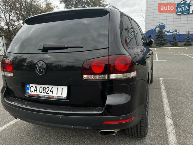 Черный Фольксваген Туарег, объемом двигателя 4.9 л и пробегом 252 тыс. км за 13800 $, фото 10 на Automoto.ua