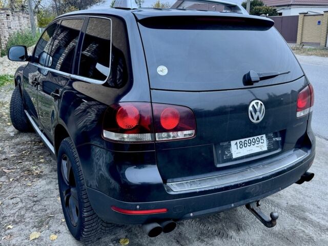 Черный Фольксваген Туарег, объемом двигателя 3 л и пробегом 332 тыс. км за 7048 $, фото 1 на Automoto.ua