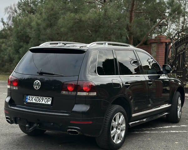 Черный Фольксваген Туарег, объемом двигателя 4.9 л и пробегом 340 тыс. км за 7900 $, фото 9 на Automoto.ua