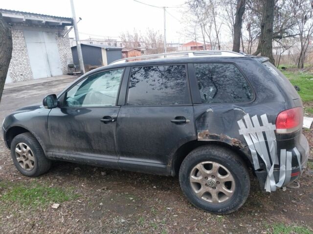 Черный Фольксваген Туарег, объемом двигателя 3 л и пробегом 680 тыс. км за 3000 $, фото 4 на Automoto.ua