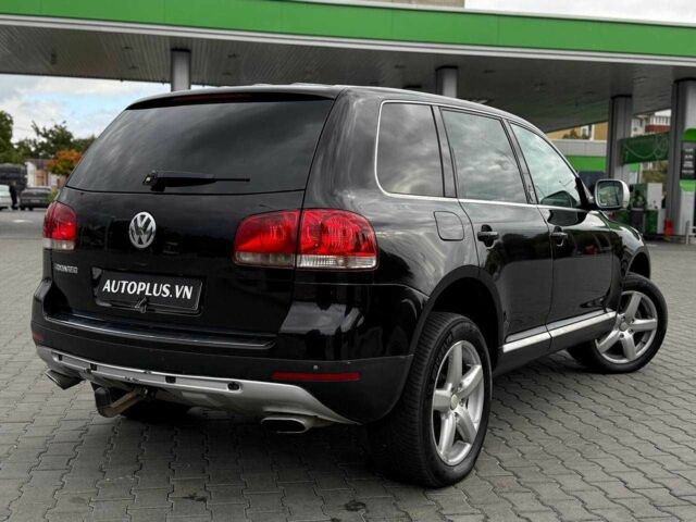 Чорний Фольксваген Туарег, об'ємом двигуна 3 л та пробігом 387 тис. км за 7300 $, фото 7 на Automoto.ua