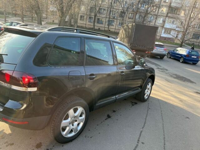 Чорний Фольксваген Туарег, об'ємом двигуна 3 л та пробігом 320 тис. км за 9400 $, фото 2 на Automoto.ua