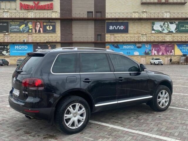 Чорний Фольксваген Туарег, об'ємом двигуна 3 л та пробігом 207 тис. км за 12000 $, фото 5 на Automoto.ua