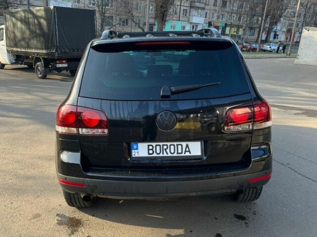 Чорний Фольксваген Туарег, об'ємом двигуна 3 л та пробігом 320 тис. км за 9400 $, фото 1 на Automoto.ua