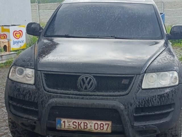 Черный Фольксваген Туарег, объемом двигателя 3 л и пробегом 320 тыс. км за 4400 $, фото 1 на Automoto.ua