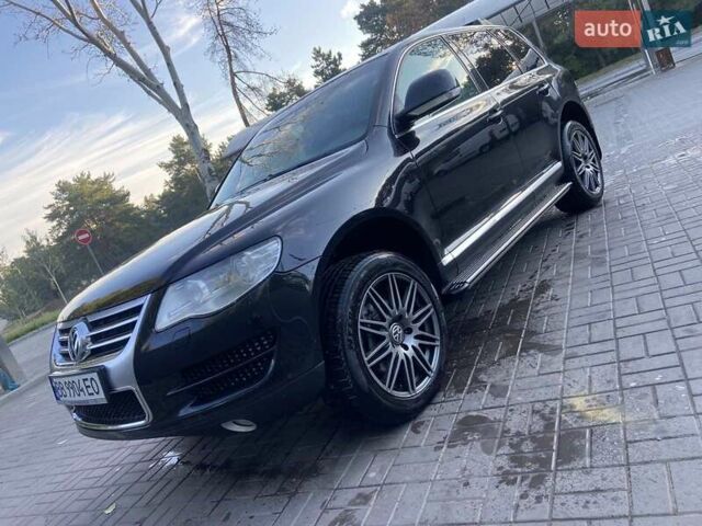Черный Фольксваген Туарег, объемом двигателя 3 л и пробегом 200 тыс. км за 13800 $, фото 1 на Automoto.ua