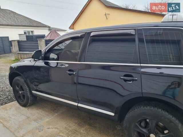 Черный Фольксваген Туарег, объемом двигателя 3 л и пробегом 258 тыс. км за 10500 $, фото 2 на Automoto.ua