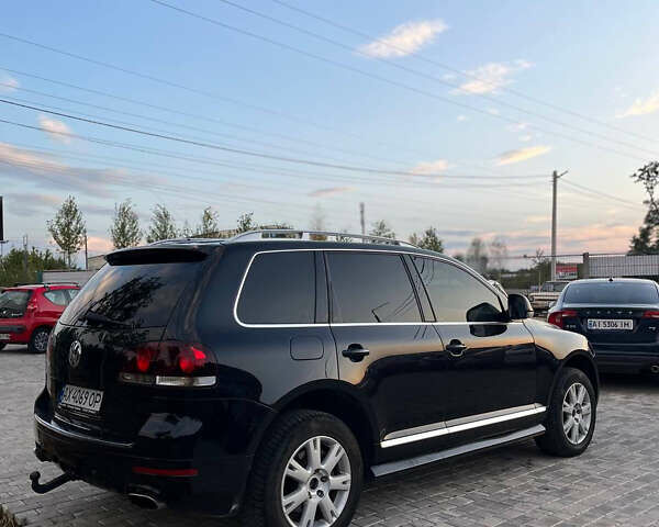 Черный Фольксваген Туарег, объемом двигателя 4.92 л и пробегом 340 тыс. км за 11000 $, фото 3 на Automoto.ua