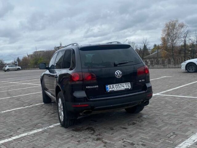 Чорний Фольксваген Туарег, об'ємом двигуна 3 л та пробігом 207 тис. км за 12000 $, фото 4 на Automoto.ua