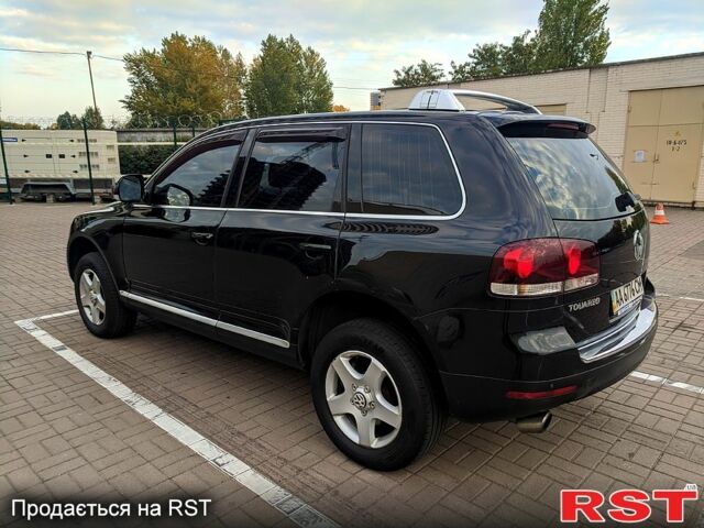 Чорний Фольксваген Туарег, об'ємом двигуна 3 л та пробігом 198 тис. км за 11300 $, фото 3 на Automoto.ua