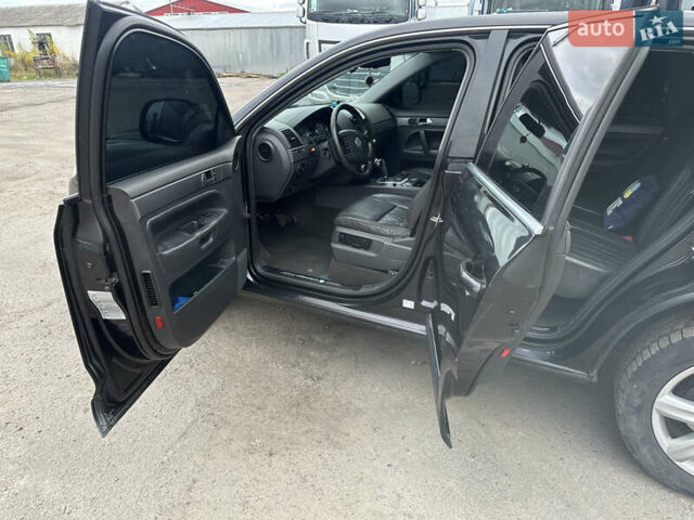 Черный Фольксваген Туарег, объемом двигателя 3 л и пробегом 320 тыс. км за 6300 $, фото 7 на Automoto.ua