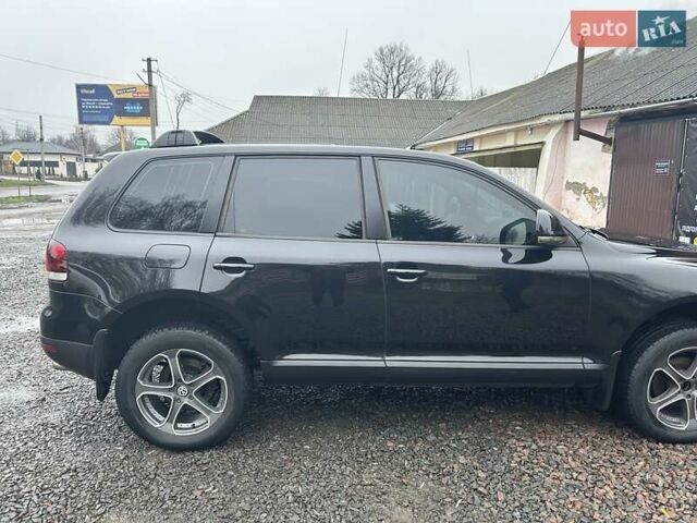 Чорний Фольксваген Туарег, об'ємом двигуна 2.46 л та пробігом 174 тис. км за 11000 $, фото 6 на Automoto.ua