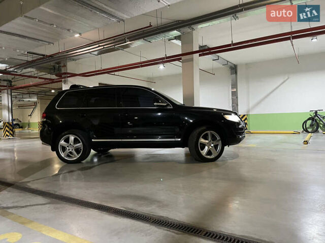 Чорний Фольксваген Туарег, об'ємом двигуна 3 л та пробігом 185 тис. км за 14500 $, фото 3 на Automoto.ua