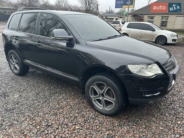 Чорний Фольксваген Туарег, об'ємом двигуна 2.46 л та пробігом 174 тис. км за 11000 $, фото 4 на Automoto.ua