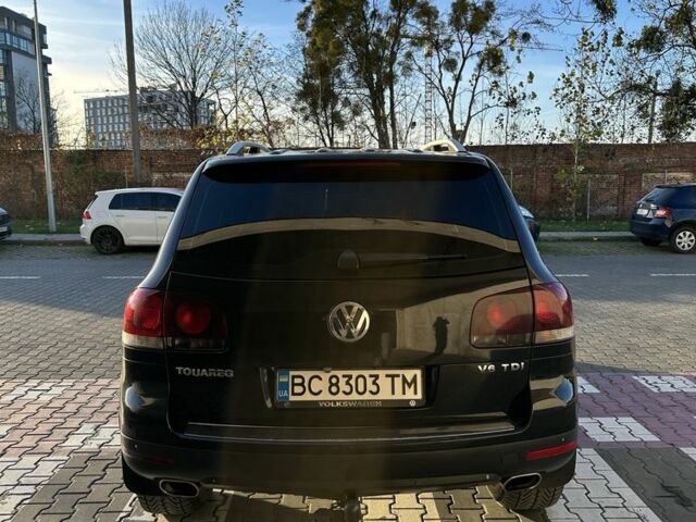 Чорний Фольксваген Туарег, об'ємом двигуна 3 л та пробігом 375 тис. км за 10500 $, фото 1 на Automoto.ua