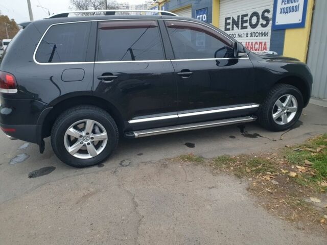 Чорний Фольксваген Туарег, об'ємом двигуна 3 л та пробігом 205 тис. км за 12000 $, фото 21 на Automoto.ua