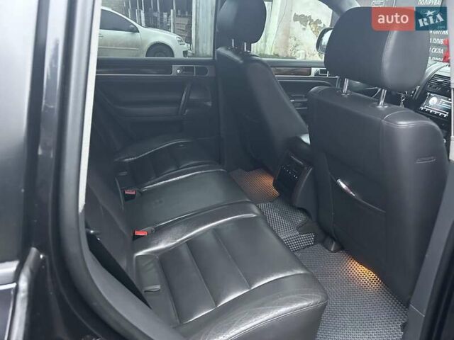 Чорний Фольксваген Туарег, об'ємом двигуна 2.46 л та пробігом 174 тис. км за 11000 $, фото 12 на Automoto.ua