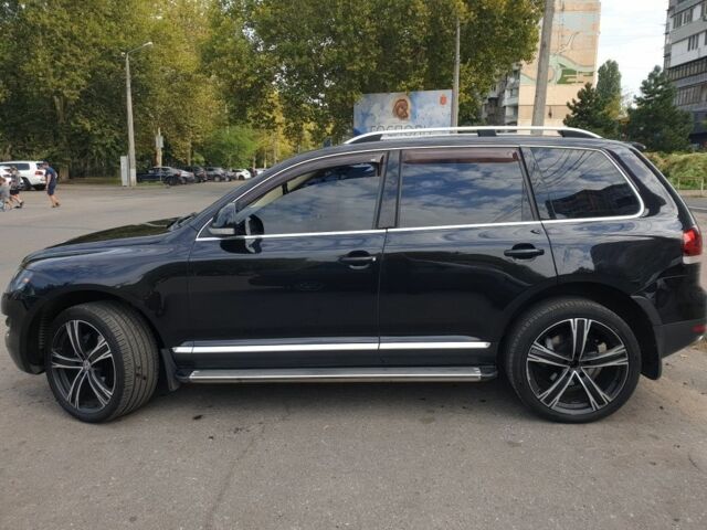 Чорний Фольксваген Туарег, об'ємом двигуна 3 л та пробігом 205 тис. км за 12000 $, фото 19 на Automoto.ua
