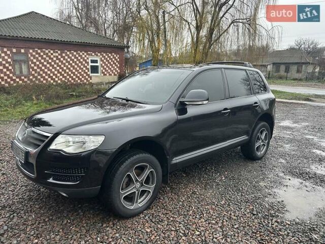 Чорний Фольксваген Туарег, об'ємом двигуна 2.46 л та пробігом 174 тис. км за 11000 $, фото 1 на Automoto.ua